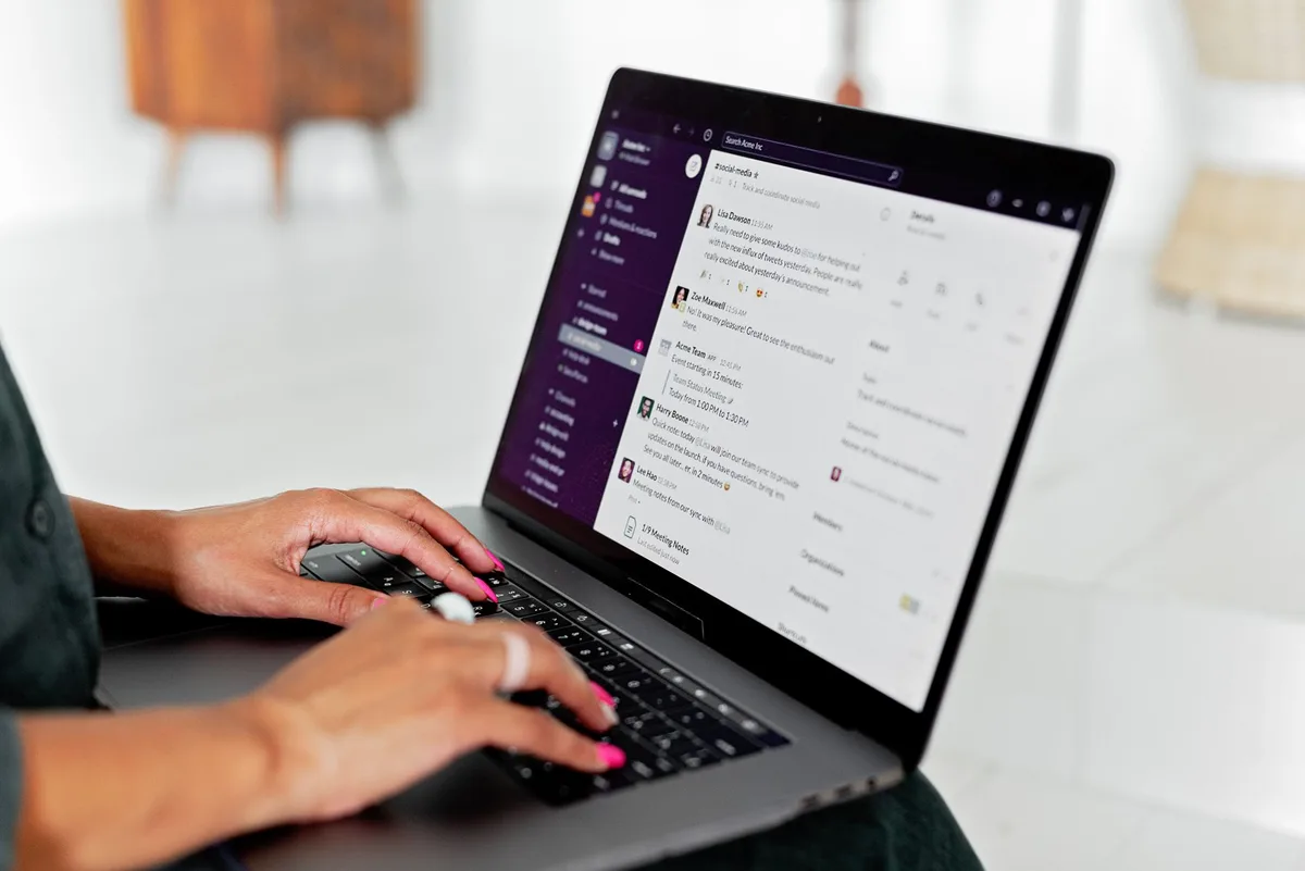 A creator setting up an automated email workflow on a laptop to deliver a lead magnet