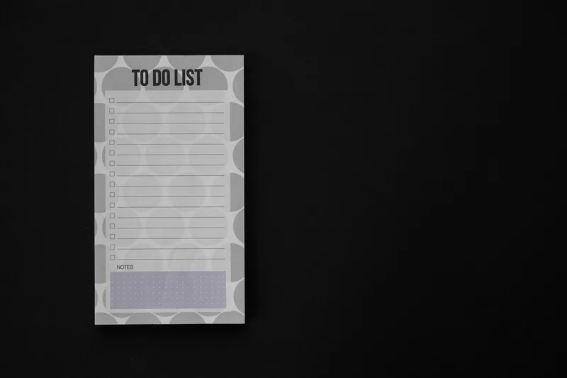 A minimalist to-do checklist notepad, simple, clean, and immediately actionable