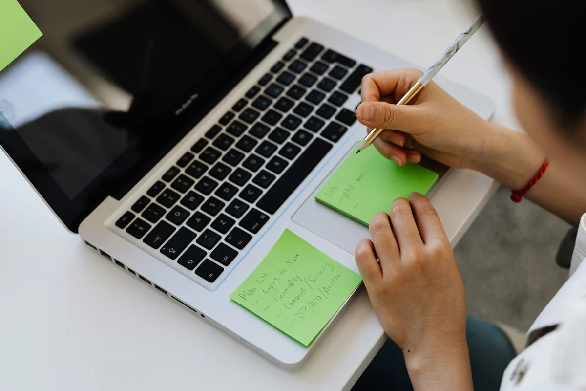 Planning a 5-day challenge email sequence at a desk