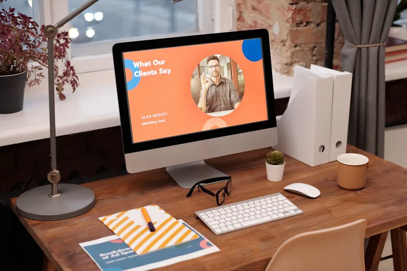 A home office workspace with a desktop computer, representing a focused environment for building a lead magnet landing page